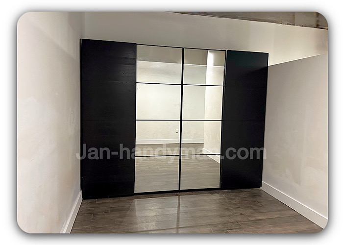 IKEA PAX hinged wardrobe doors installed and aligned